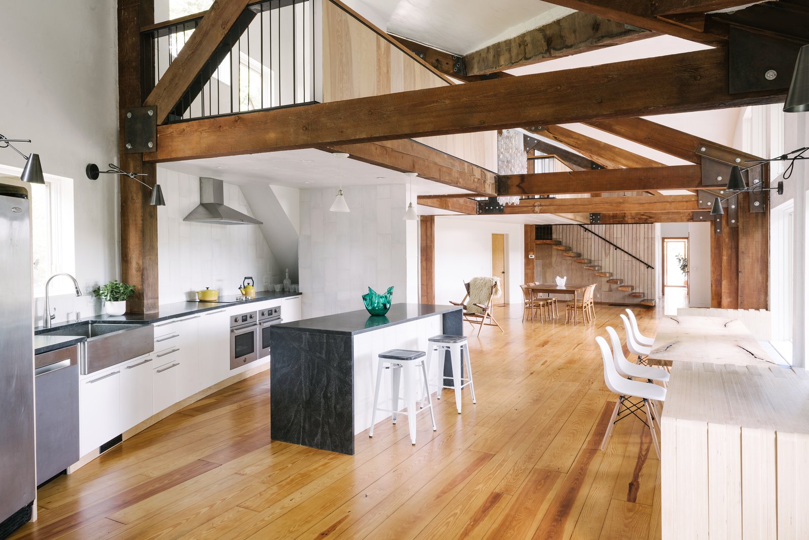 The expansive ground floor was further opened up with a new balcony design, great stairs, and a new kitchen that creates a home ideal for both large entertaining and intimate family dinners.  