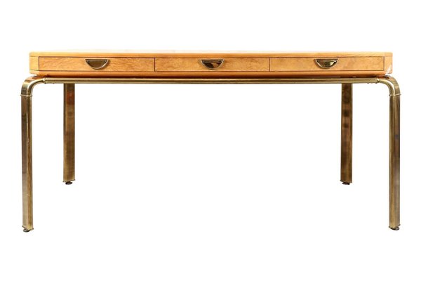 With its rounded legs and high-polish hardware, this burled wood desk with three drawers spells minimalist, 1970s luxe. Based out of the furniture mecca of Grand Rapids, Michigan, the John Widdicomb Furniture Company began manufacturing in the 1800s and started producing exclusively modern designs in the 1930s.