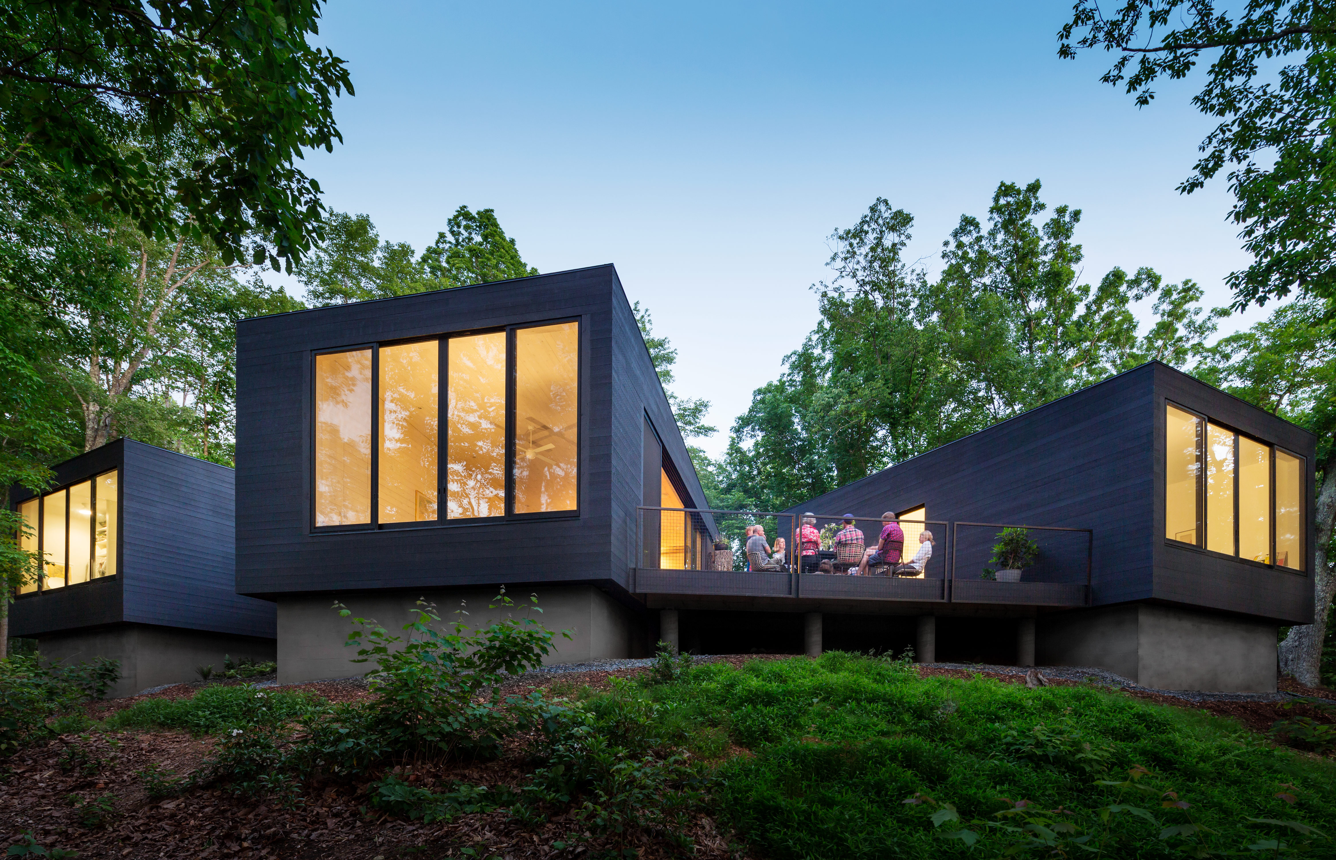 A family gathers on the deck of Virginia riverside home.